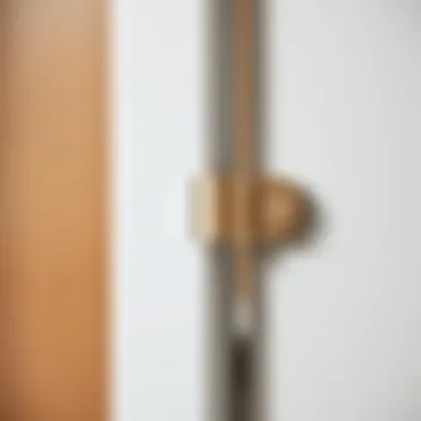 Sleek Modern Bathroom Vanity Hinge Close up of a modern hinge on a bathroom vanity door showcasing sleek design