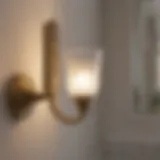 Elegant brass sconce illuminating a contemporary bathroom