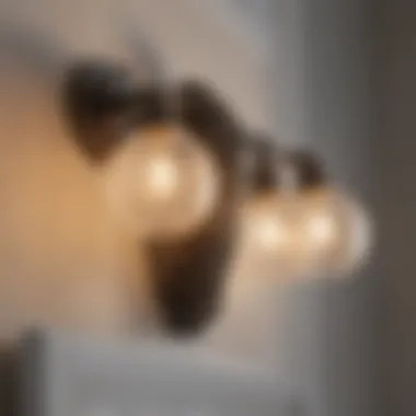 Close-up of Quoizel bathroom vanity light fixtures with unique finishes.