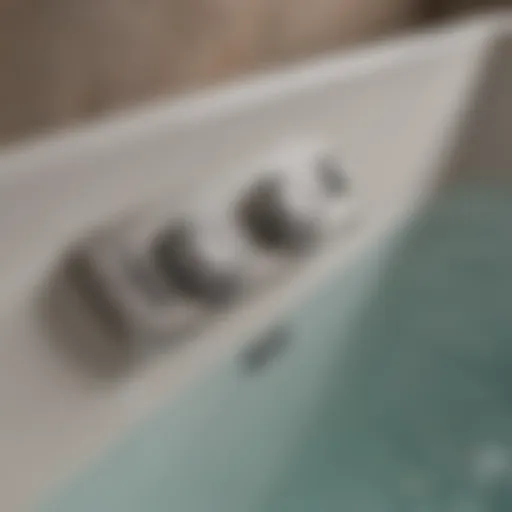 Close-up view of a Jacuzzi bath air switch demonstrating its sleek design.