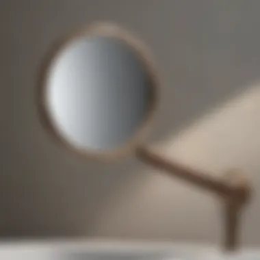 Close-up of a sleek handheld magnifying mirror with bright lighting