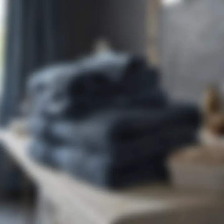 Close-up of plush slate blue towels folded neatly