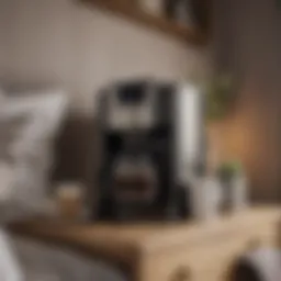 Elegant coffee maker on a bedside table surrounded by decor