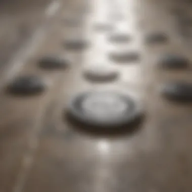 Different types of shower floor drains arranged for comparison